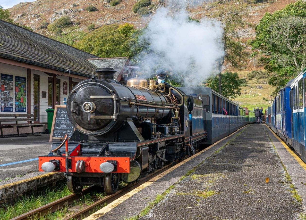Heritage steam engine River Esk arriving at Dalegarth station in the heart of the Eskdale Valley